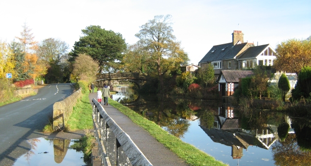 pretty canal with nice houses and a tow path near lancaster